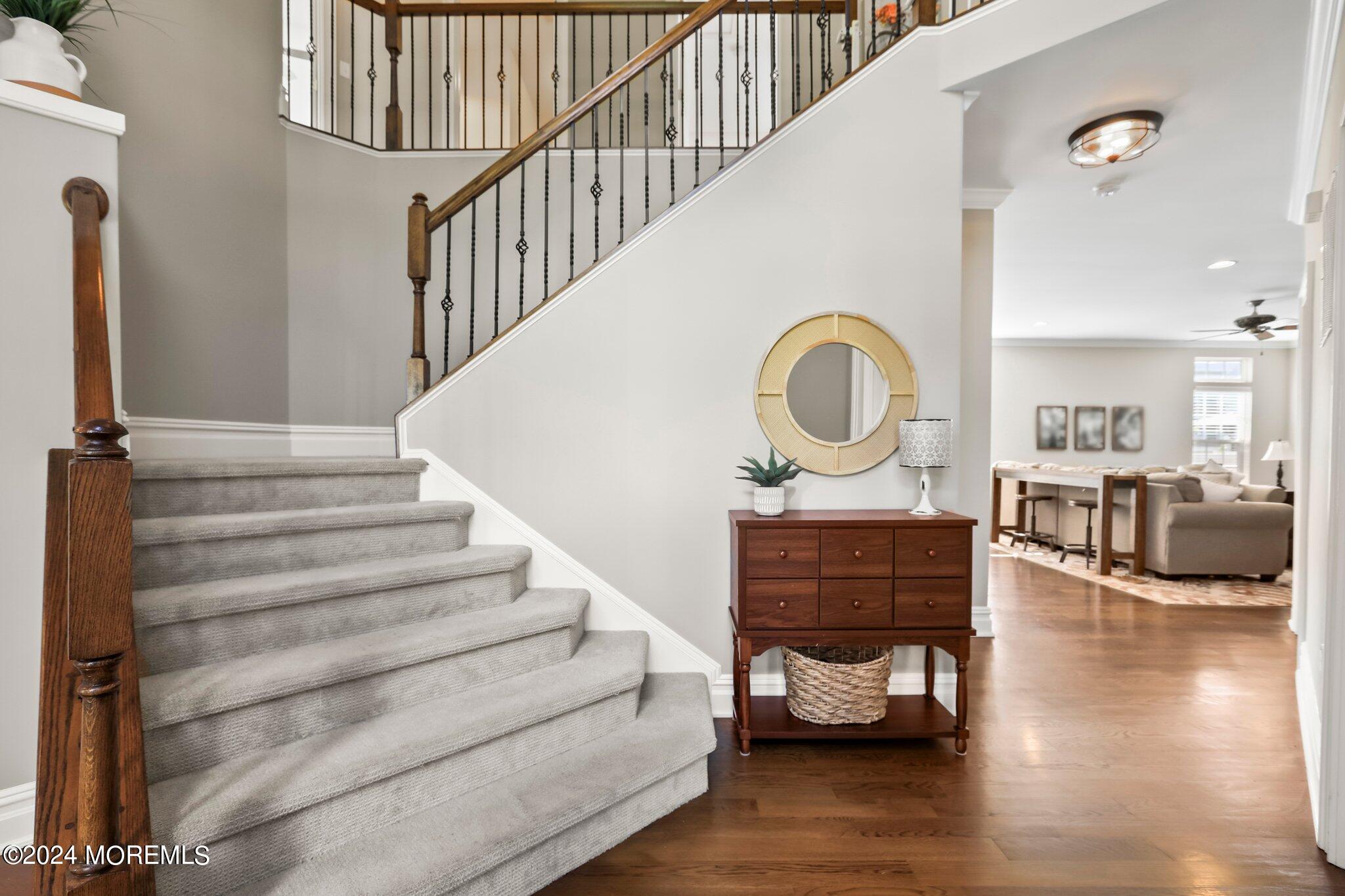 24 Firestone Drive Howell, NJ 07731 - Photo 11 of 70 a view of entryway and hall with wooden floor