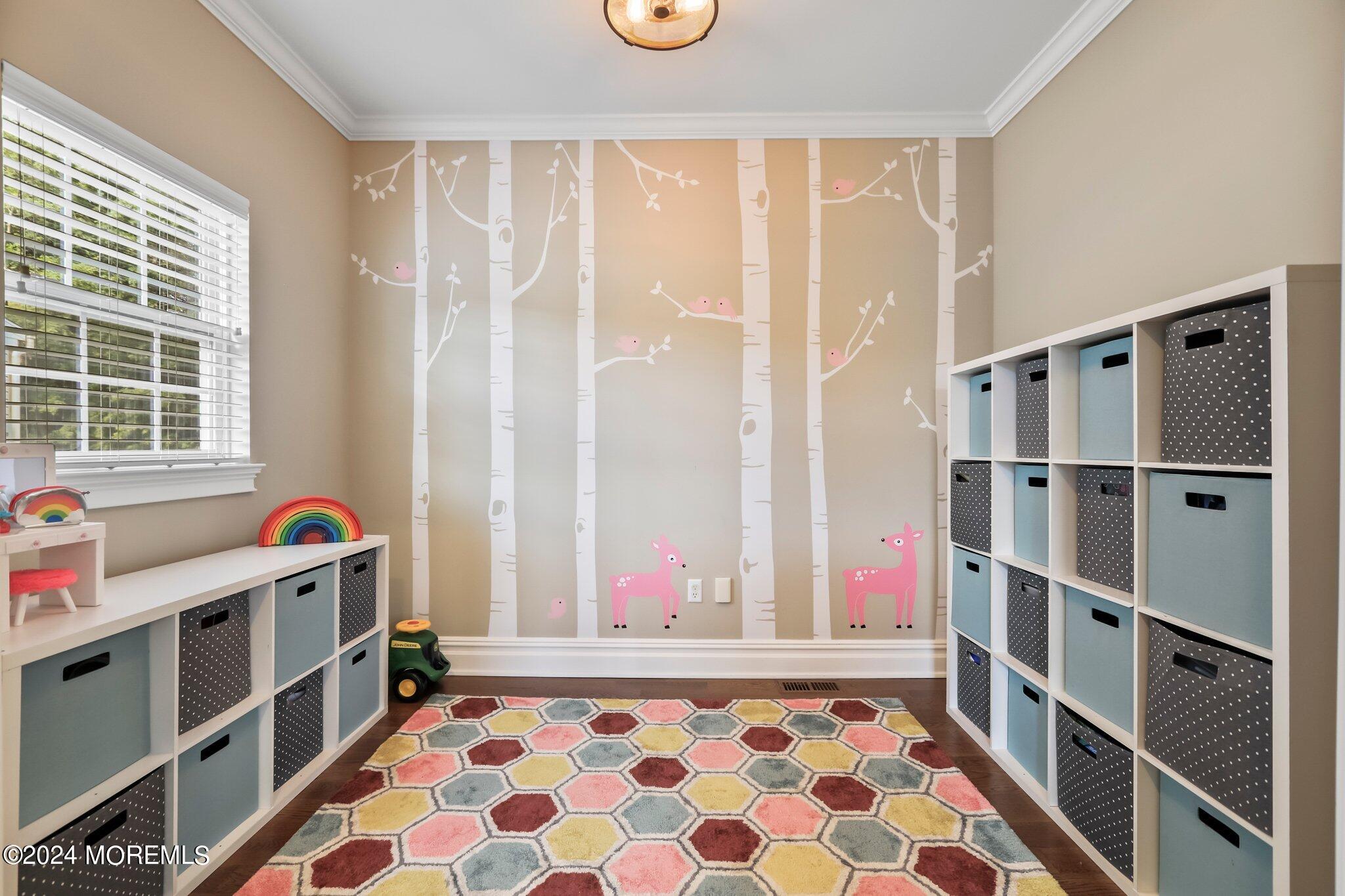 24 Firestone Drive Howell, NJ 07731 - Photo 25 of 70 a living room with baby crib furniture and a window
