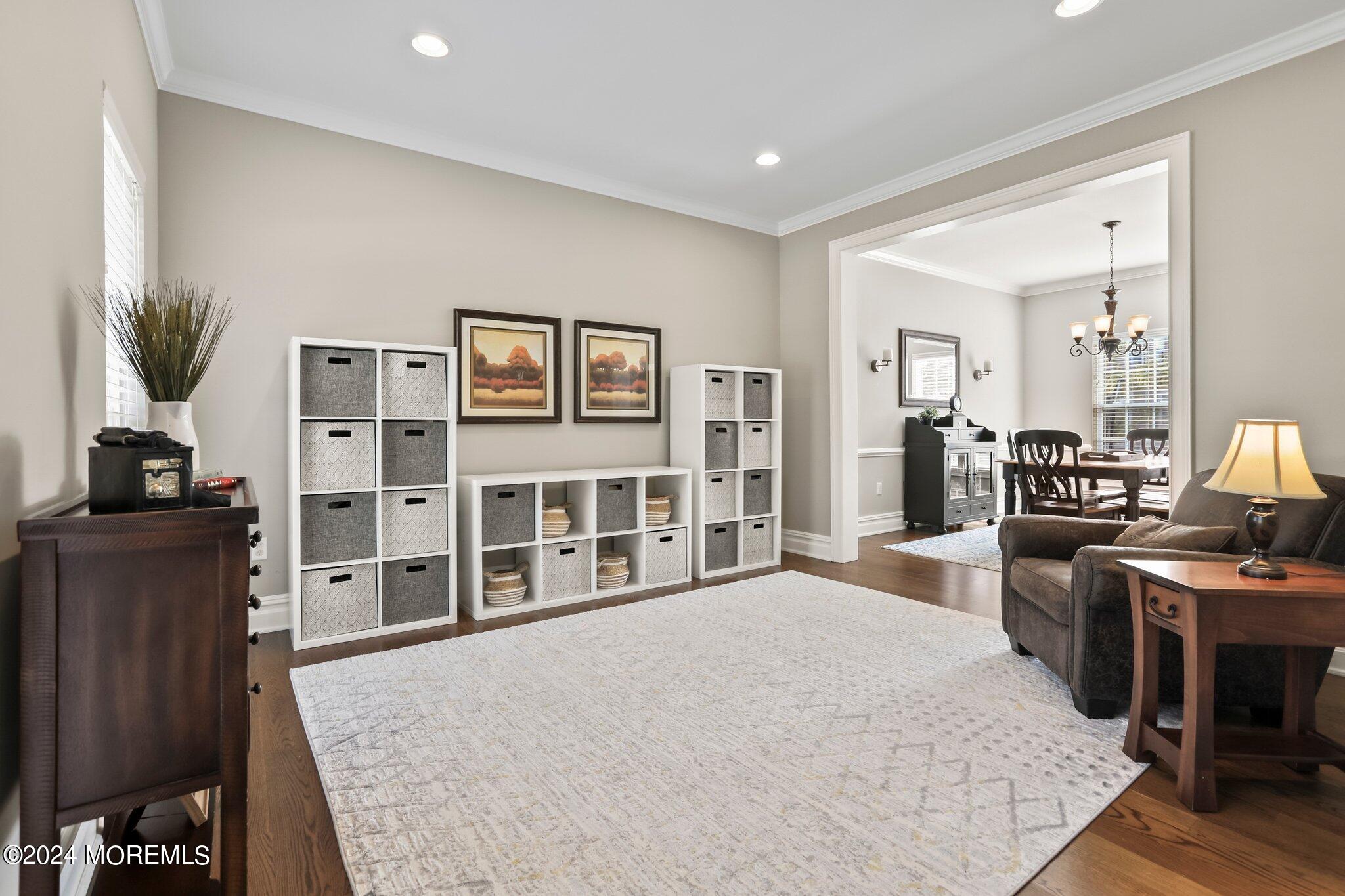 24 Firestone Drive Howell, NJ 07731 - Photo 29 of 70 a bedroom with furniture and a book shelf