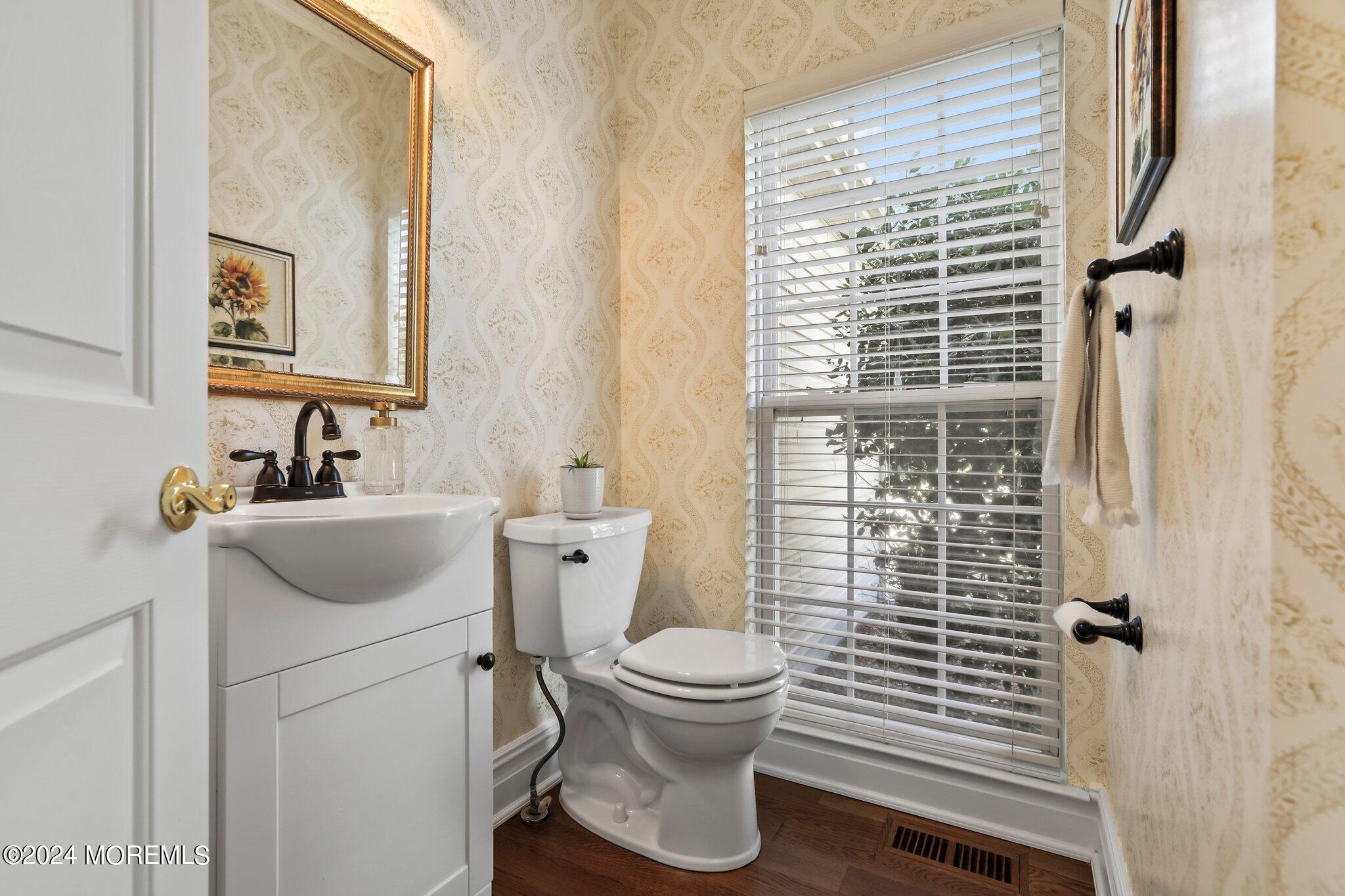 24 Firestone Drive Howell, NJ 07731 - Photo 30 of 70 a bathroom with a sink toilet and shower