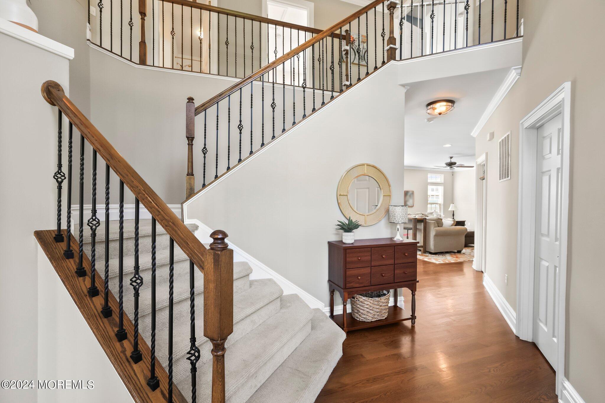 24 Firestone Drive Howell, NJ 07731 - Photo 10 of 70 a view of entryway and hall with wooden floor