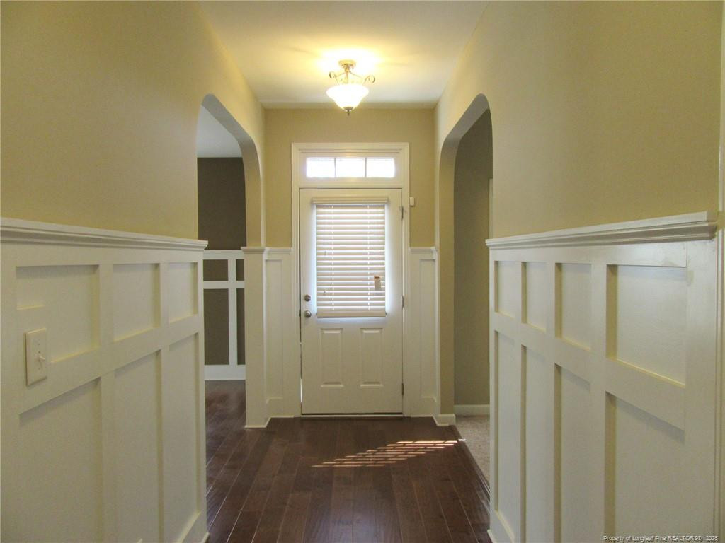 2142 Yates Ranch Road Hope Mills, NC 28348 - Photo 7 of 32 a view of empty room with wooden floor