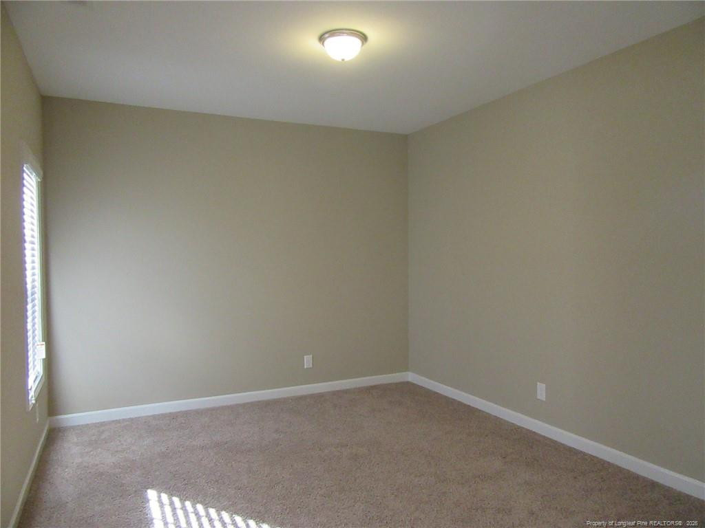2142 Yates Ranch Road Hope Mills, NC 28348 - Photo 8 of 32 a view of an empty room
