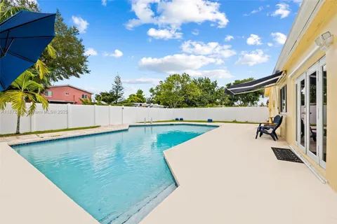 swimming pool view with a outdoor space