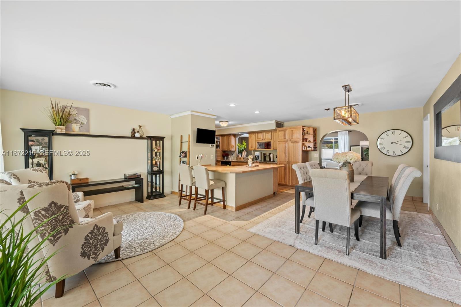 1925 North 39th Avenue Hollywood, FL 33021 - Photo 6 of 20 a living room with furniture a table and chairs
