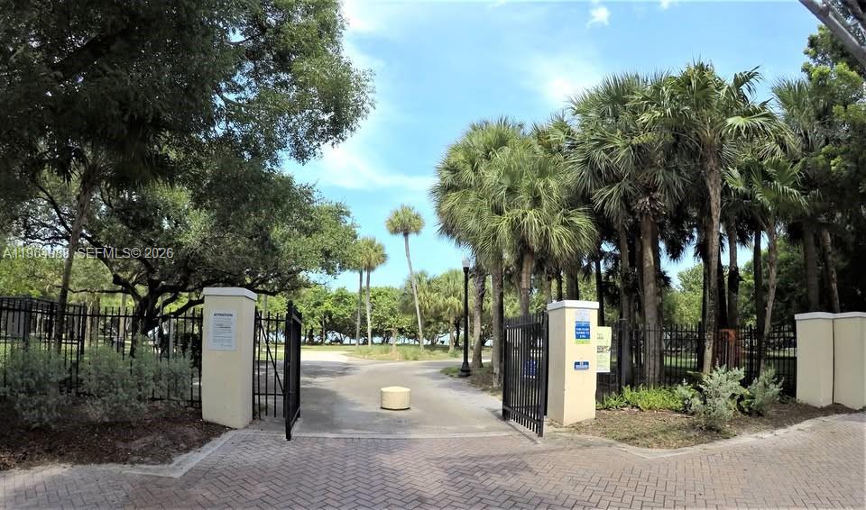 744 85th Street, Unit 1 Miami Beach, FL 33141 - Photo 16 of 17 a street view with large trees