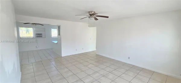 a view of a room with white walls and white walls