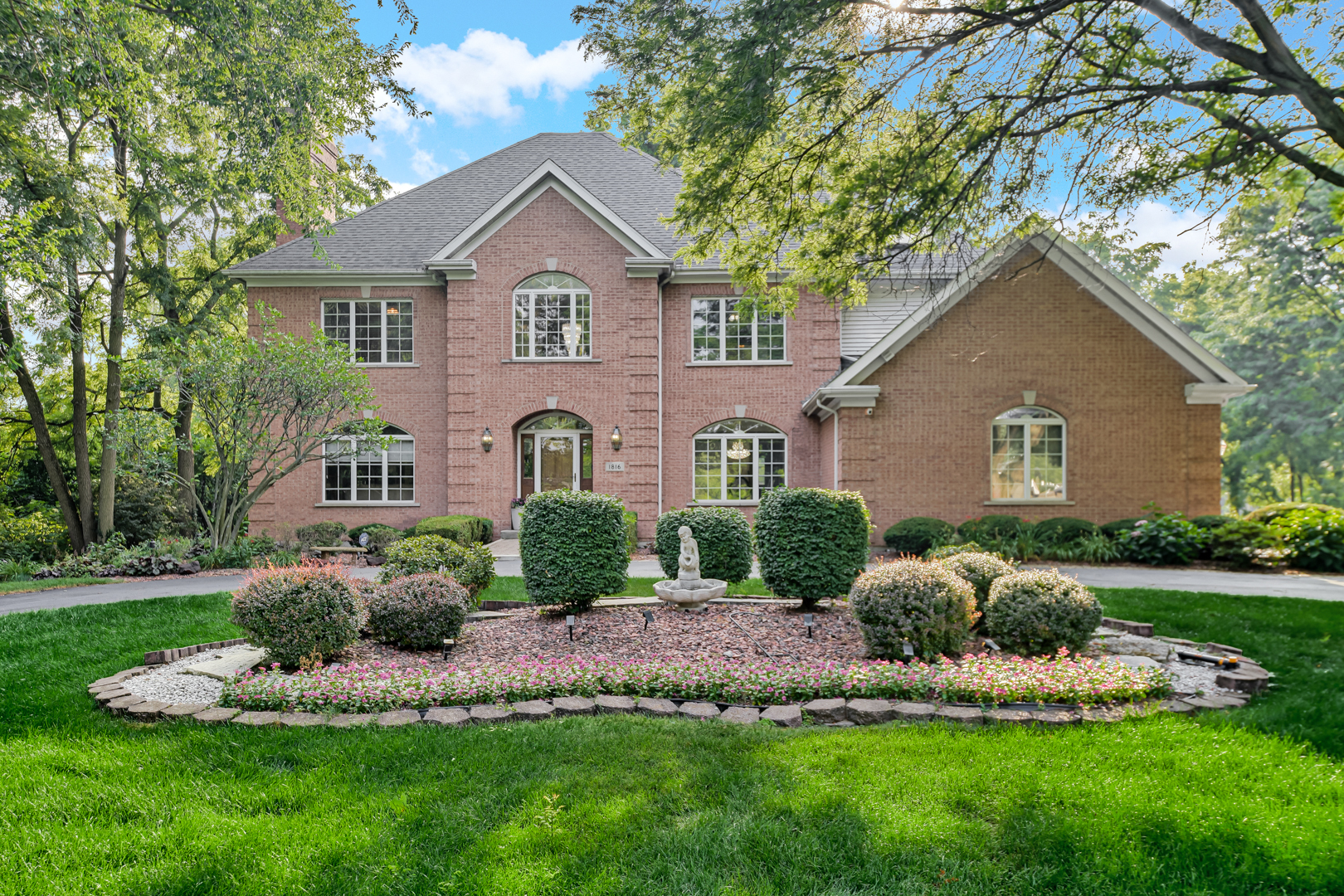 1816 Princeton Road Flossmoor, IL 60422 - Photo 2 of 26 a front view of a house with a yard and garage