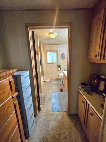 a view of a kitchen from a kitchen