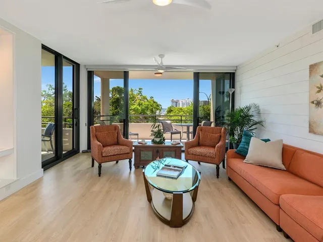 a living room with furniture and a table