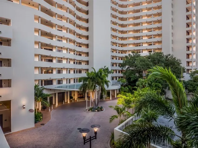 a room with a table and chairs