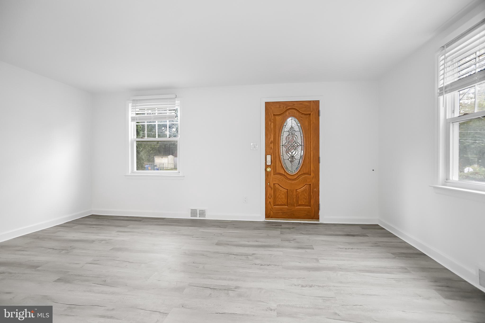 1913 Winton Avenue Havertown, PA 19083 - Photo 4 of 17 an empty room with windows and closet