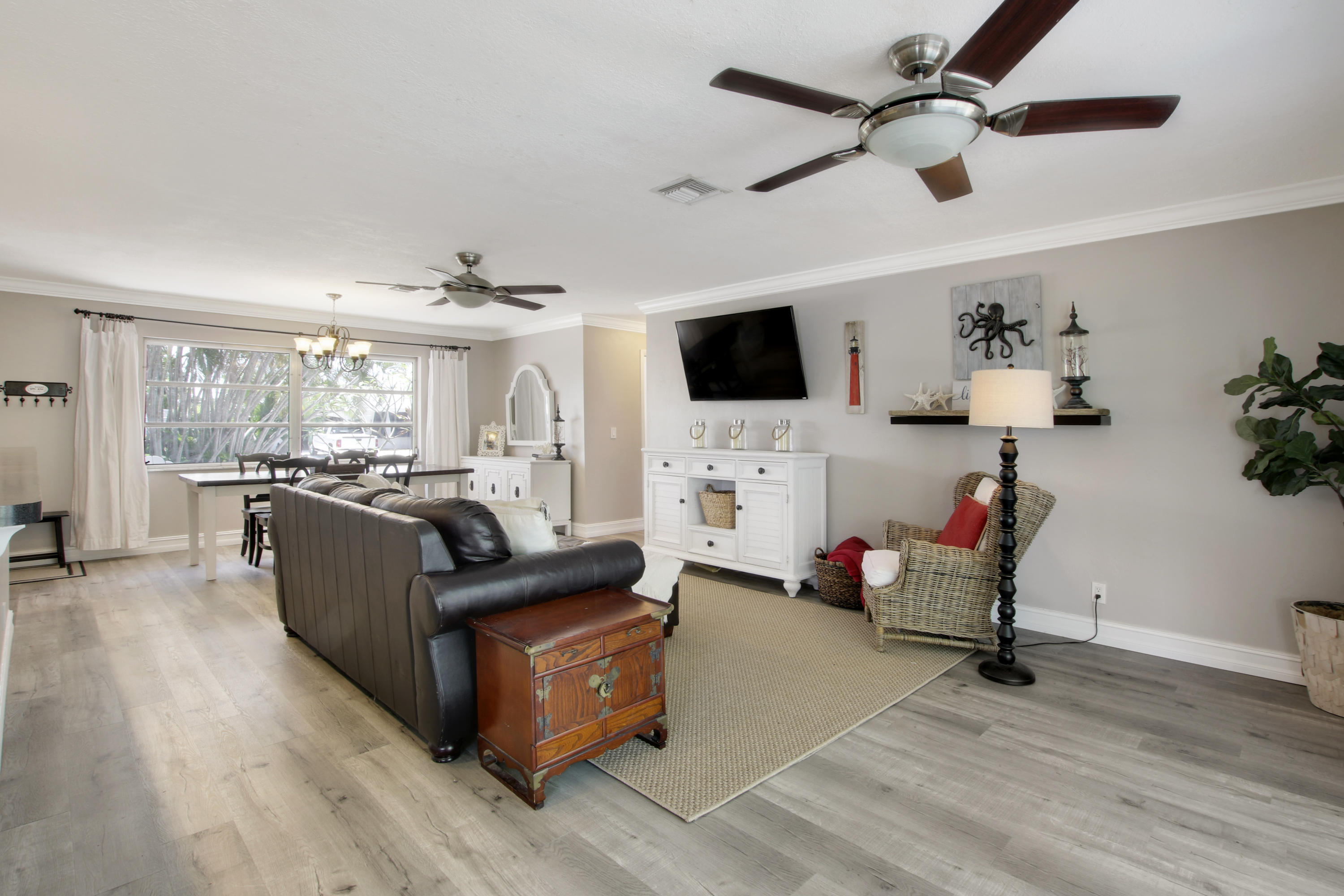 361 Mars Avenue Tequesta, FL 33469 - Photo 13 of 28 a living room with furniture and a flat screen tv