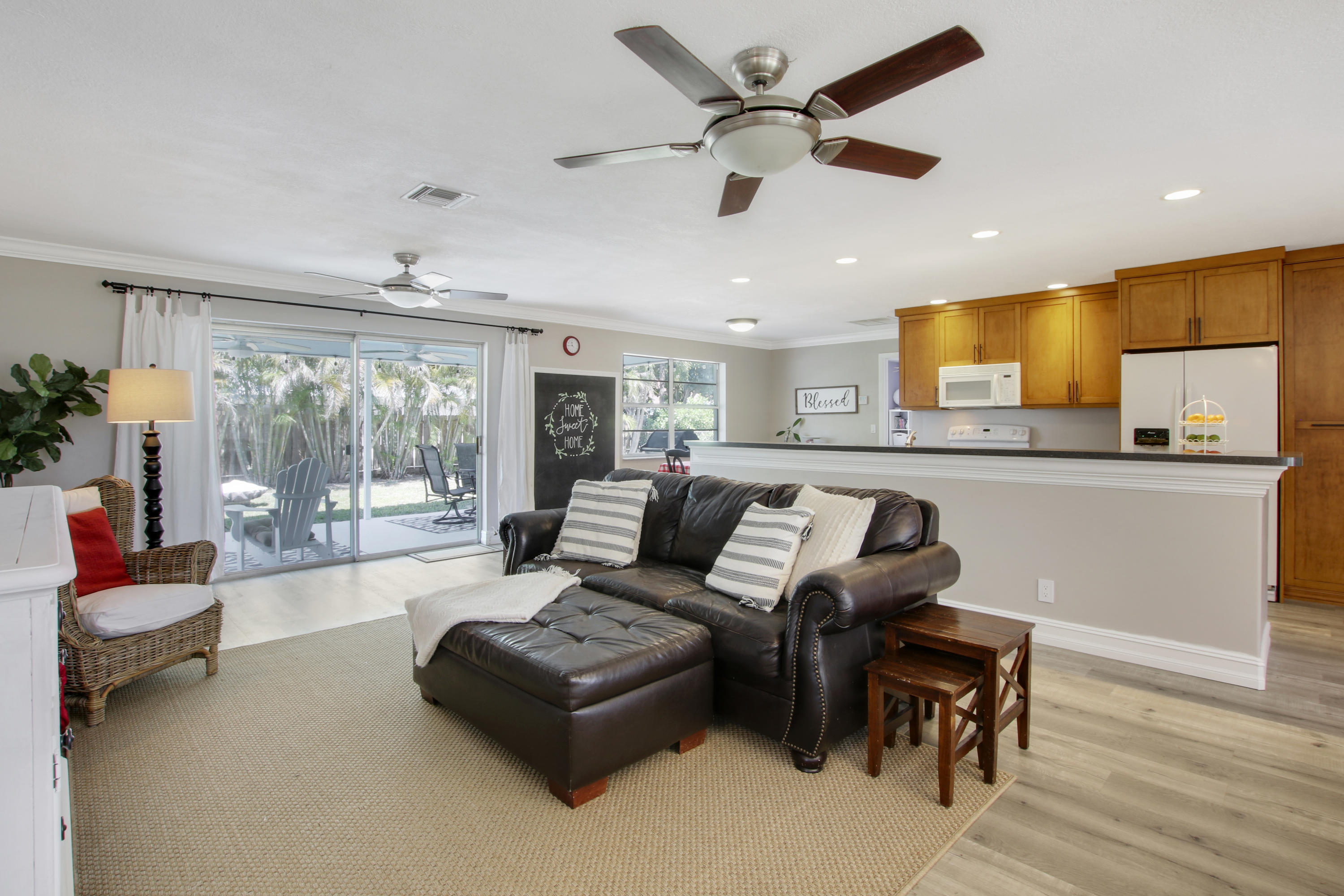 361 Mars Avenue Tequesta, FL 33469 - Photo 14 of 28 a living room with furniture and a large window