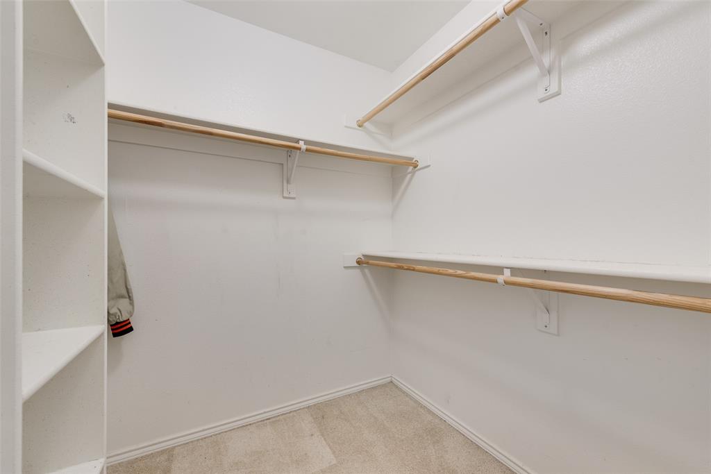 526 Morningside Court Midlothian, TX 76065 - Photo 19 of 28 a view of an empty walk in closet