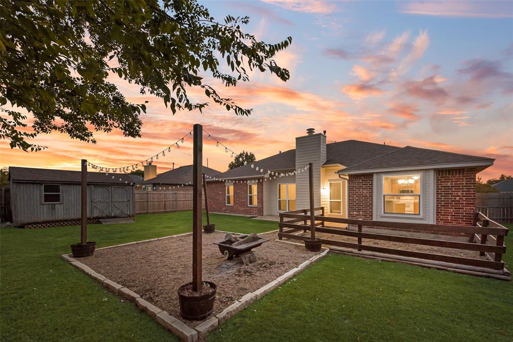526 Morningside Court Midlothian, TX 76065 - Photo 6 of 28 a front view of a house with garden