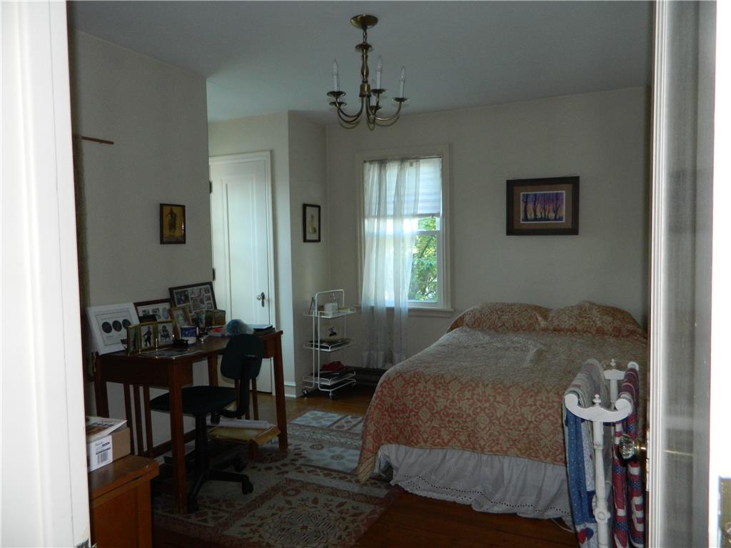 2130 Huntington Street Bethlehem, PA 18017 - Photo 14 of 23 Hardwood floors and a sun-filled window create a comfortable and inviting bedroom.