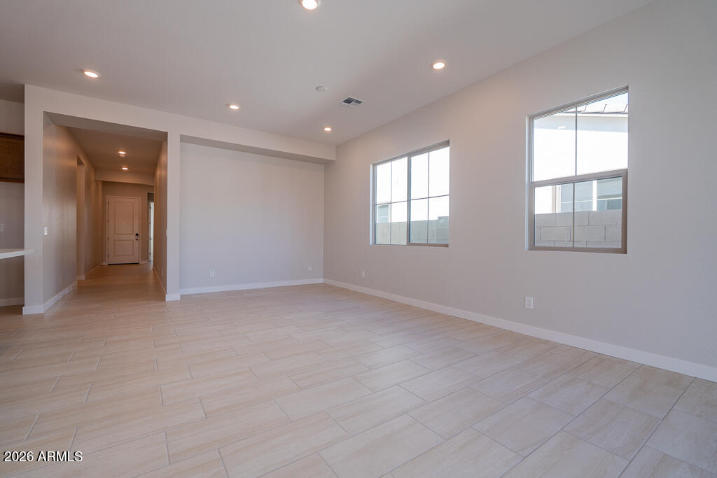 5879 South Red Rock Street Gilbert, AZ 85298 - Photo 5 of 18 an empty room with windows and closet