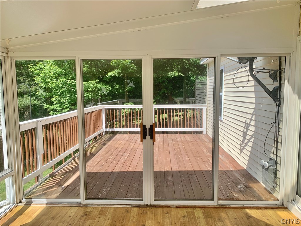 10149 Bailey Lake Road Brookfield, NY 13480 - Photo 30 of 49 The right side has sliding doors as well and provi