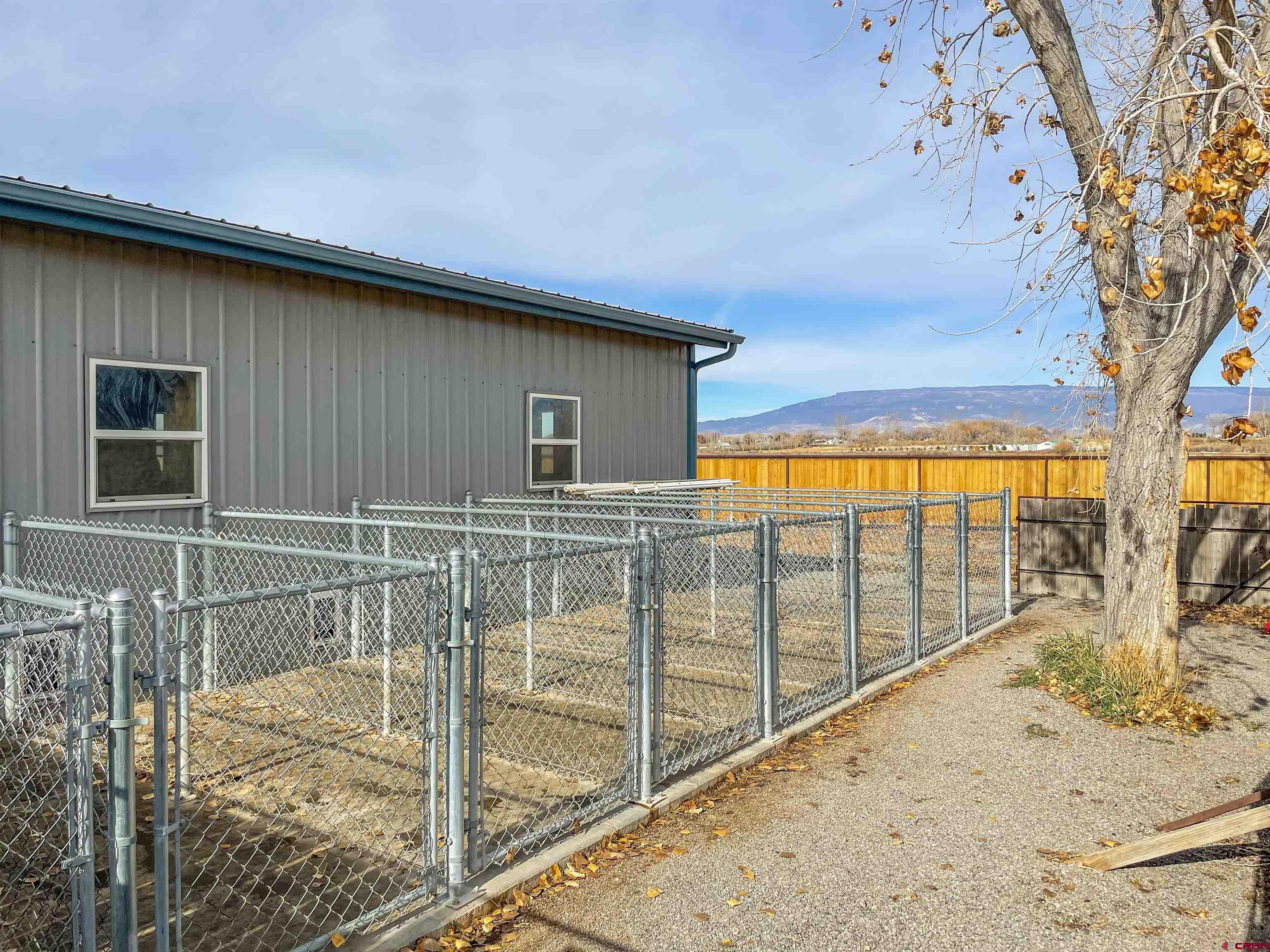 4379 1900th Road Delta, CO 81416 - Photo 22 of 35 a view of a house with a backyard
