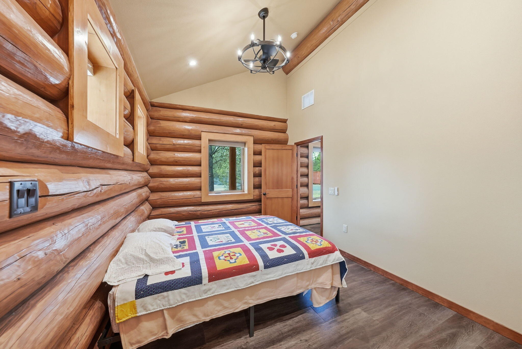 54270 Huntington Road La Pine, OR 97739 - Photo 22 of 68 a bedroom with furniture and a wooden floor