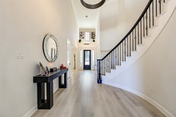 a view of a hallway with seating area