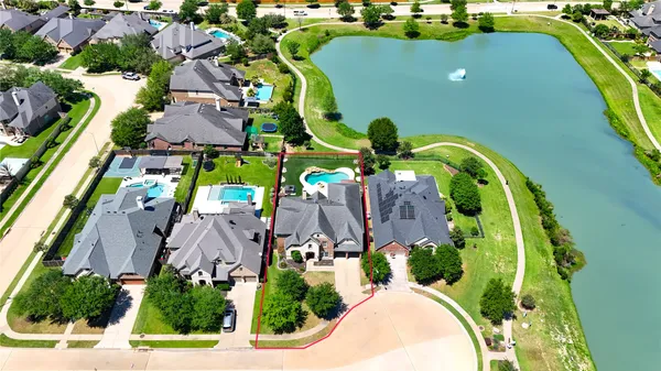 an aerial view of a house with a garden