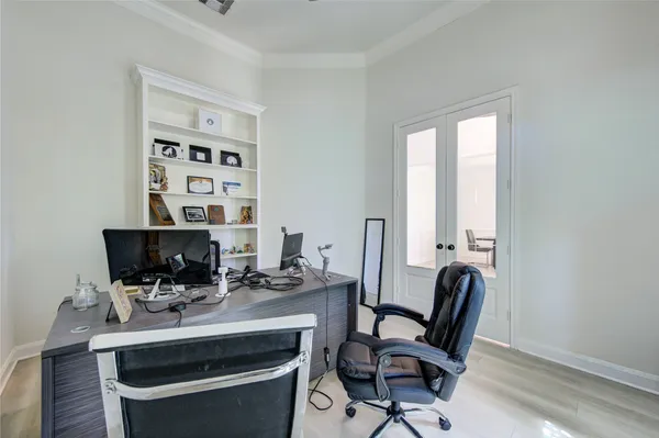 a view of a workspace with furniture