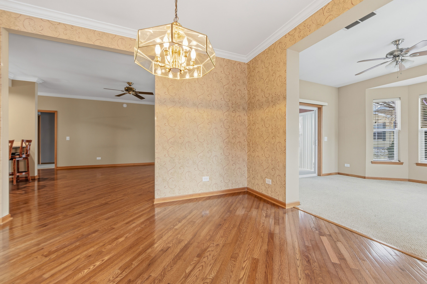 102 Hitching Post Lane Grayslake, IL 60030 - Photo 21 of 38 wooden floor in an empty room with a window