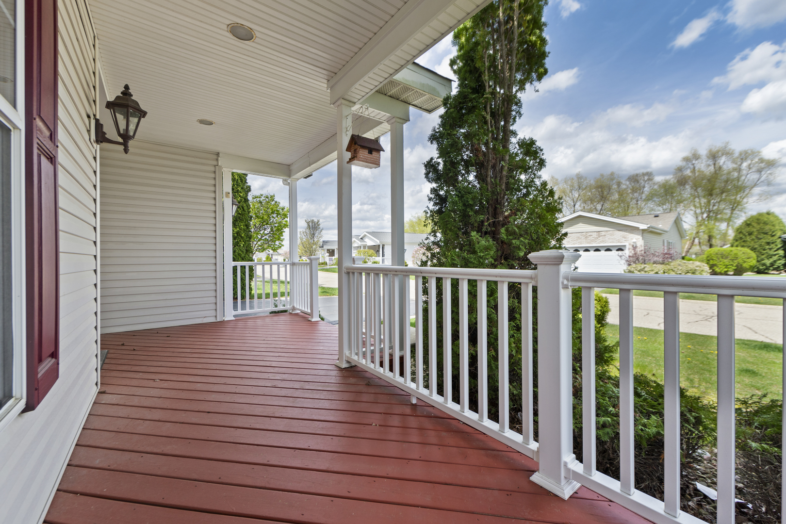 102 Hitching Post Lane Grayslake, IL 60030 - Photo 3 of 38 a view of a deck with wooden floor and fence