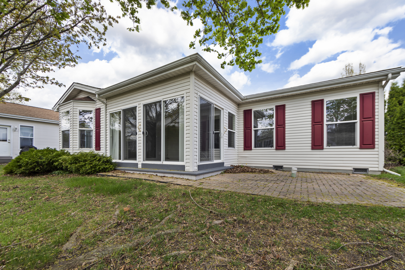 102 Hitching Post Lane Grayslake, IL 60030 - Photo 33 of 38 a house view with a garden space