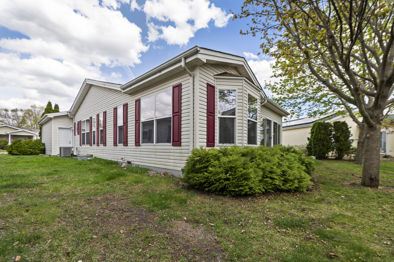 102 Hitching Post Lane Grayslake, IL 60030 - Photo 34 of 38 a front view of a house with garden