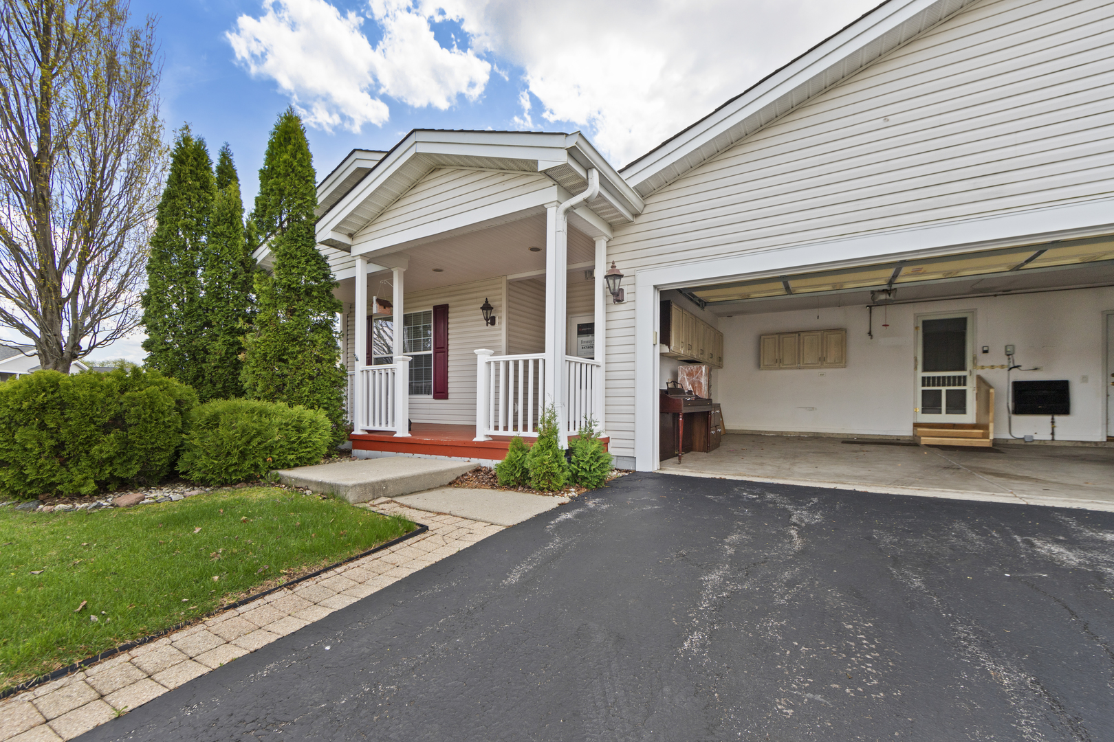 102 Hitching Post Lane Grayslake, IL 60030 - Photo 38 of 38 a front view of a house with a yard and garage