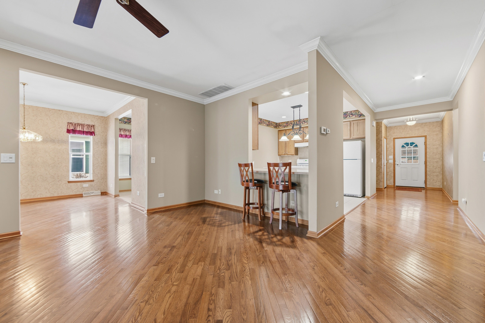 102 Hitching Post Lane Grayslake, IL 60030 - Photo 7 of 38 a view of empty room with wooden floor