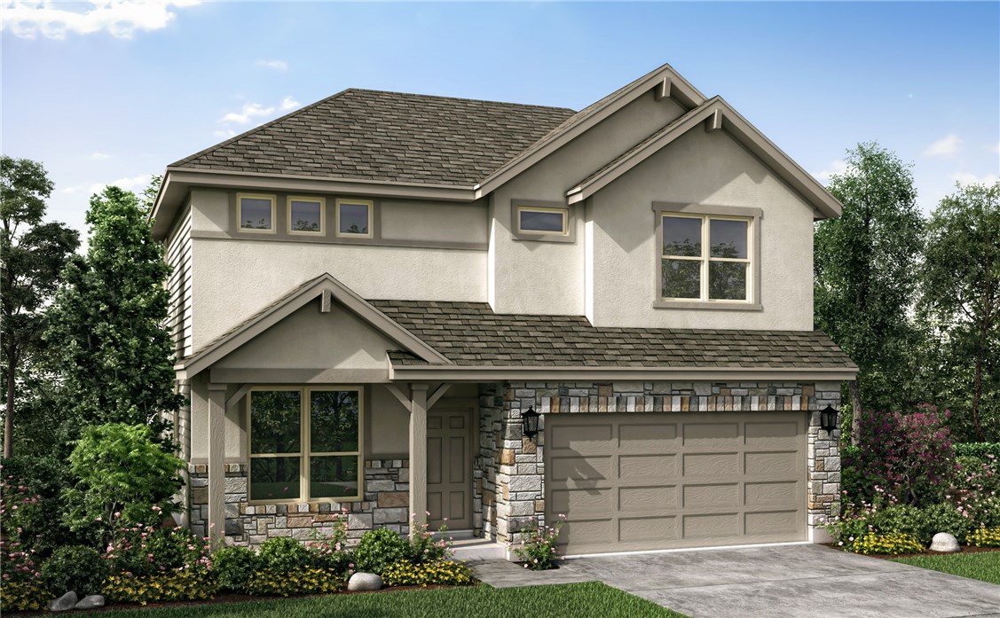 a front view of a house with a yard and outdoor seating