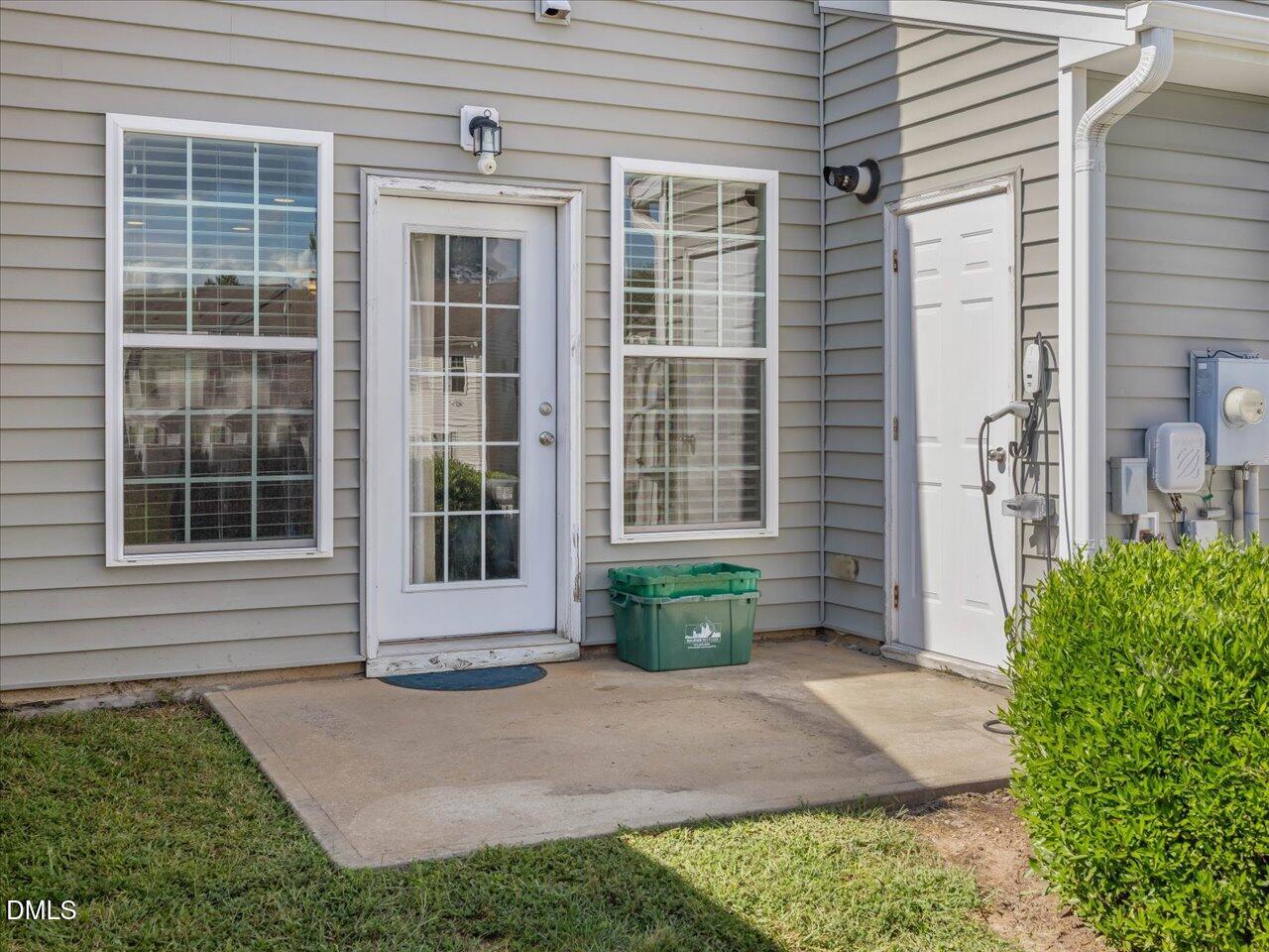 409 Provincial Street Raleigh, NC 27603 - Photo 17 of 44 a front view of a house with a yard