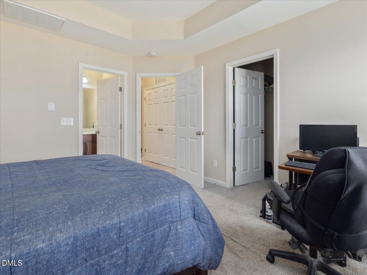 409 Provincial Street Raleigh, NC 27603 - Photo 26 of 44 a bedroom with a workspace