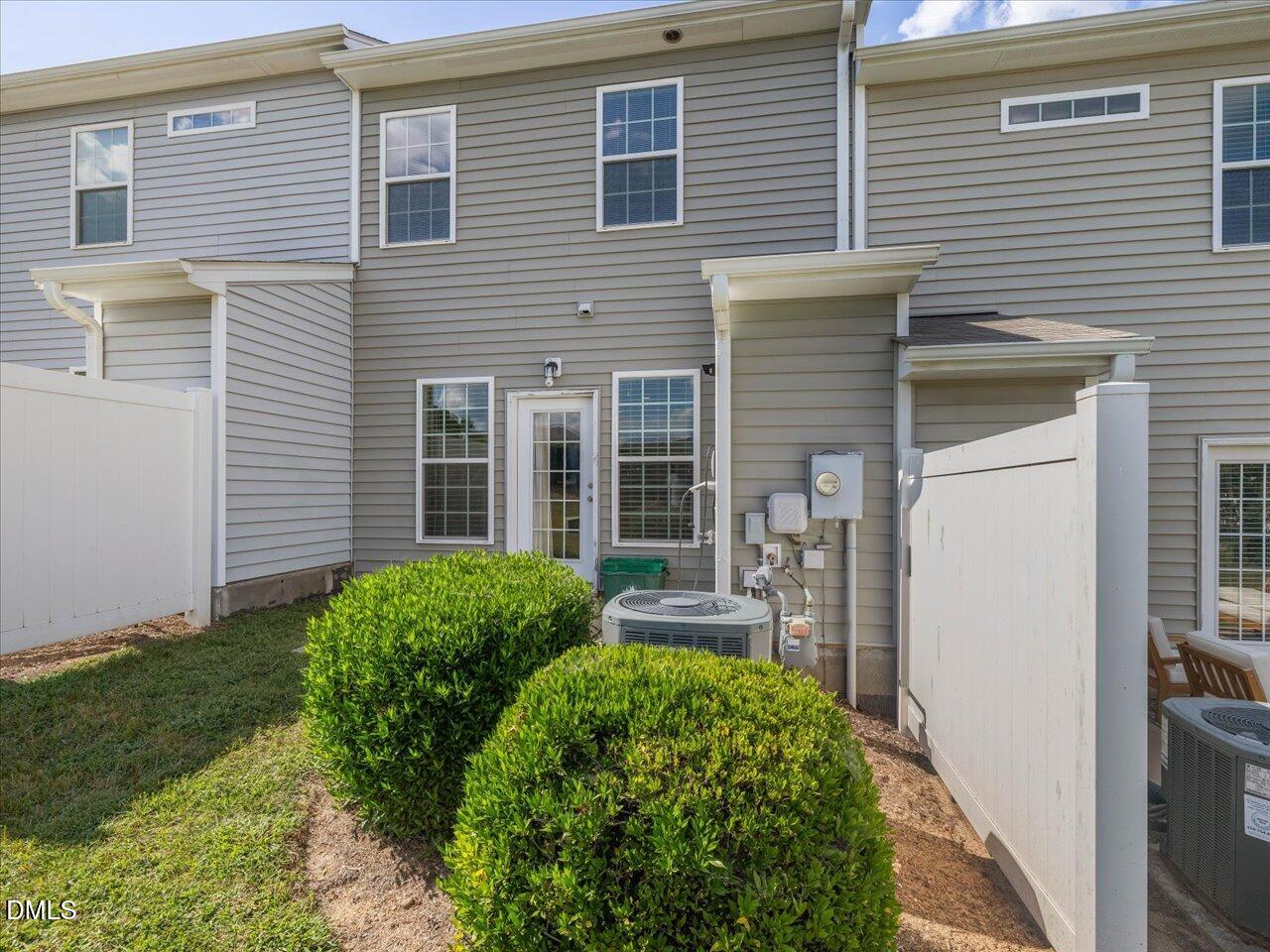 409 Provincial Street Raleigh, NC 27603 - Photo 33 of 44 a front view of a house with garden