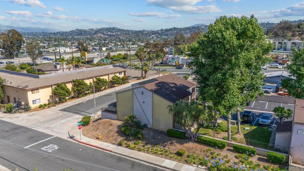 1280 West Main Street, Unit 42 El Cajon, CA 92020 - Photo 22 of 43 an aerial view of residential houses with outdoor space and trees