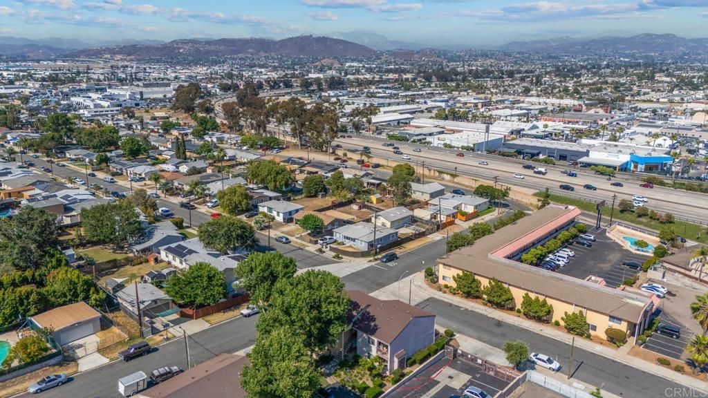 1280 West Main Street, Unit 42 El Cajon, CA 92020 - Photo 26 of 43 an aerial view of residential houses with outdoor space