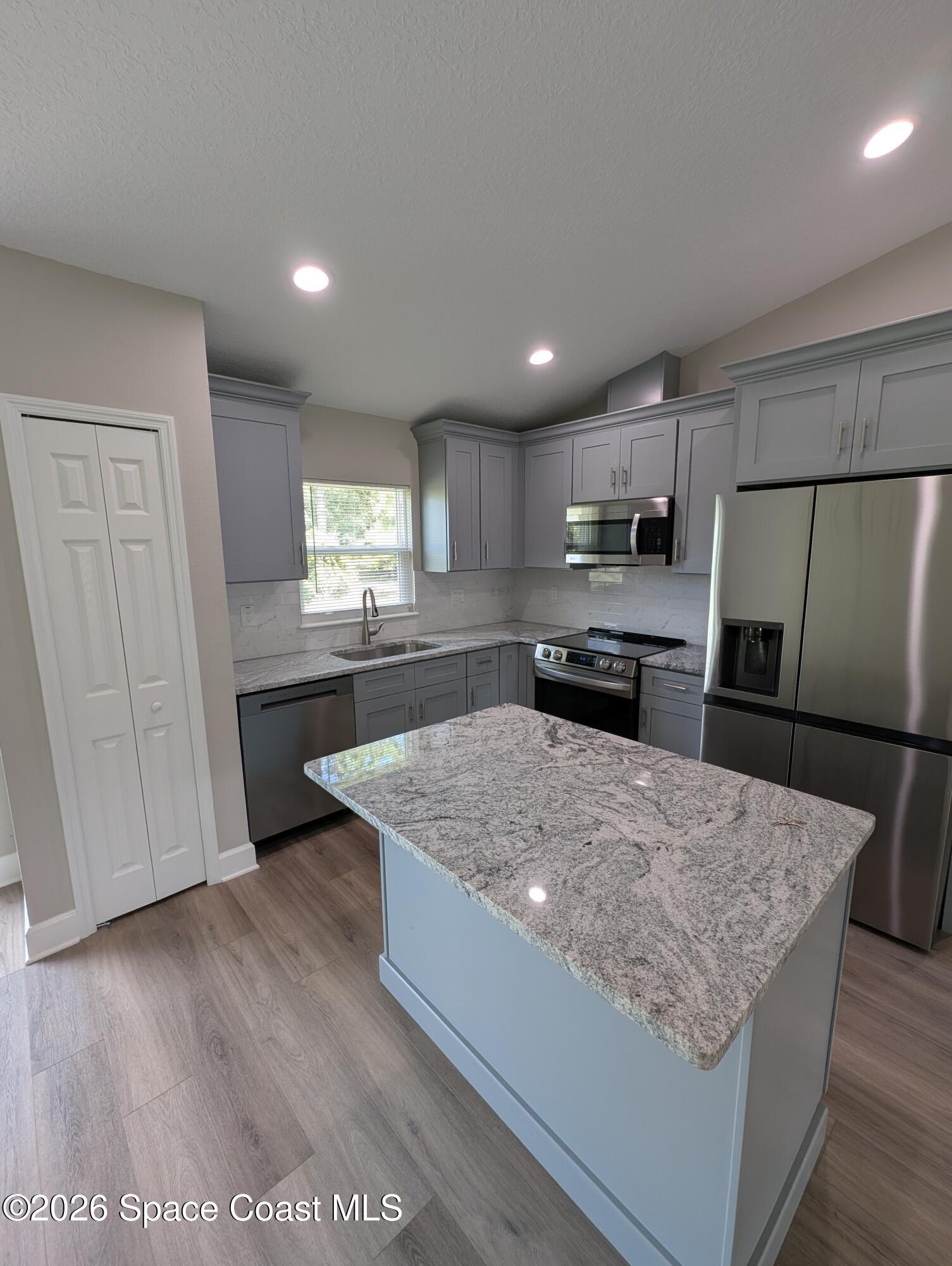 1356 Torgerson Road Southeast Palm Bay, FL 32909 - Photo 22 of 46 Kitchen with Island
