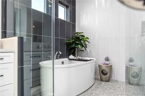 a front view of house with yard outdoor seating and barbeque oven