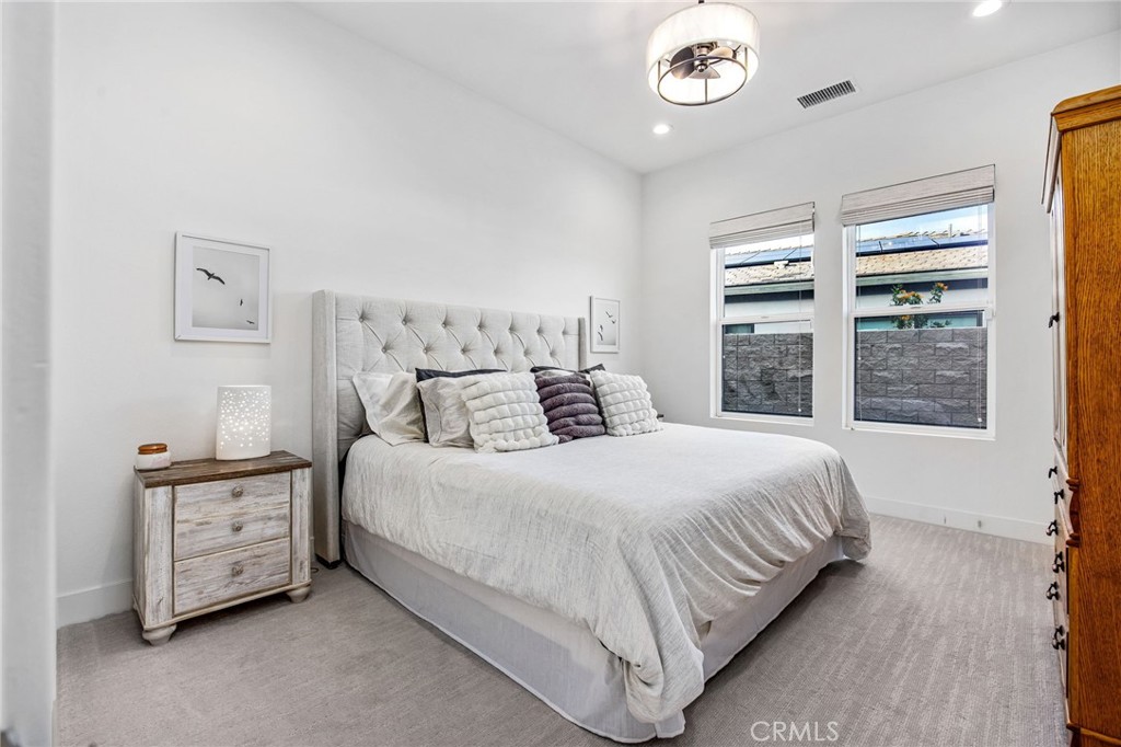 80440 Old Ranch Trail South La Quinta, CA 92253 - Photo 22 of 46 a bedroom with a bed and a window