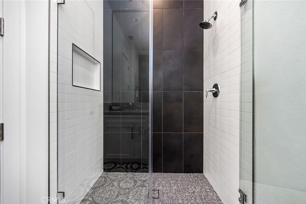 80440 Old Ranch Trail South La Quinta, CA 92253 - Photo 26 of 46 a bathroom with a glass door shower