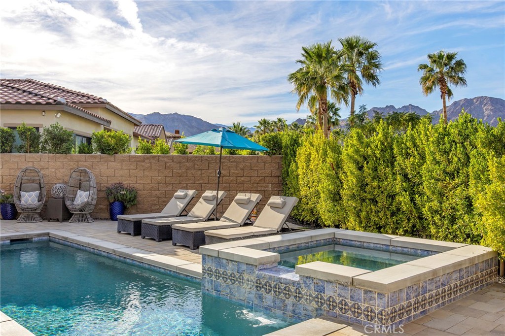 80440 Old Ranch Trail South La Quinta, CA 92253 - Photo 38 of 46 a view of a swimming pool with a patio