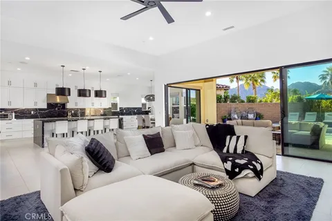 a kitchen with stainless steel appliances granite countertop a stove and cabinets
