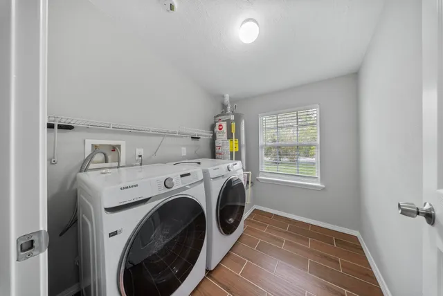 a utility room with dryer and washer