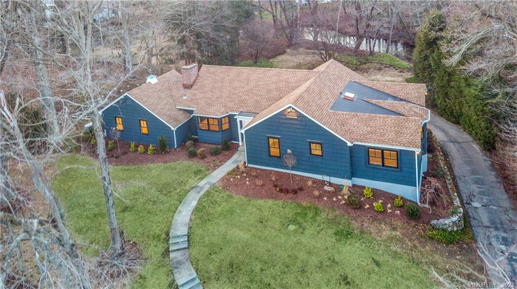 181 Long Lots Road Westport, CT 06880 - Photo 1 of 40 an aerial view of a house with a yard
