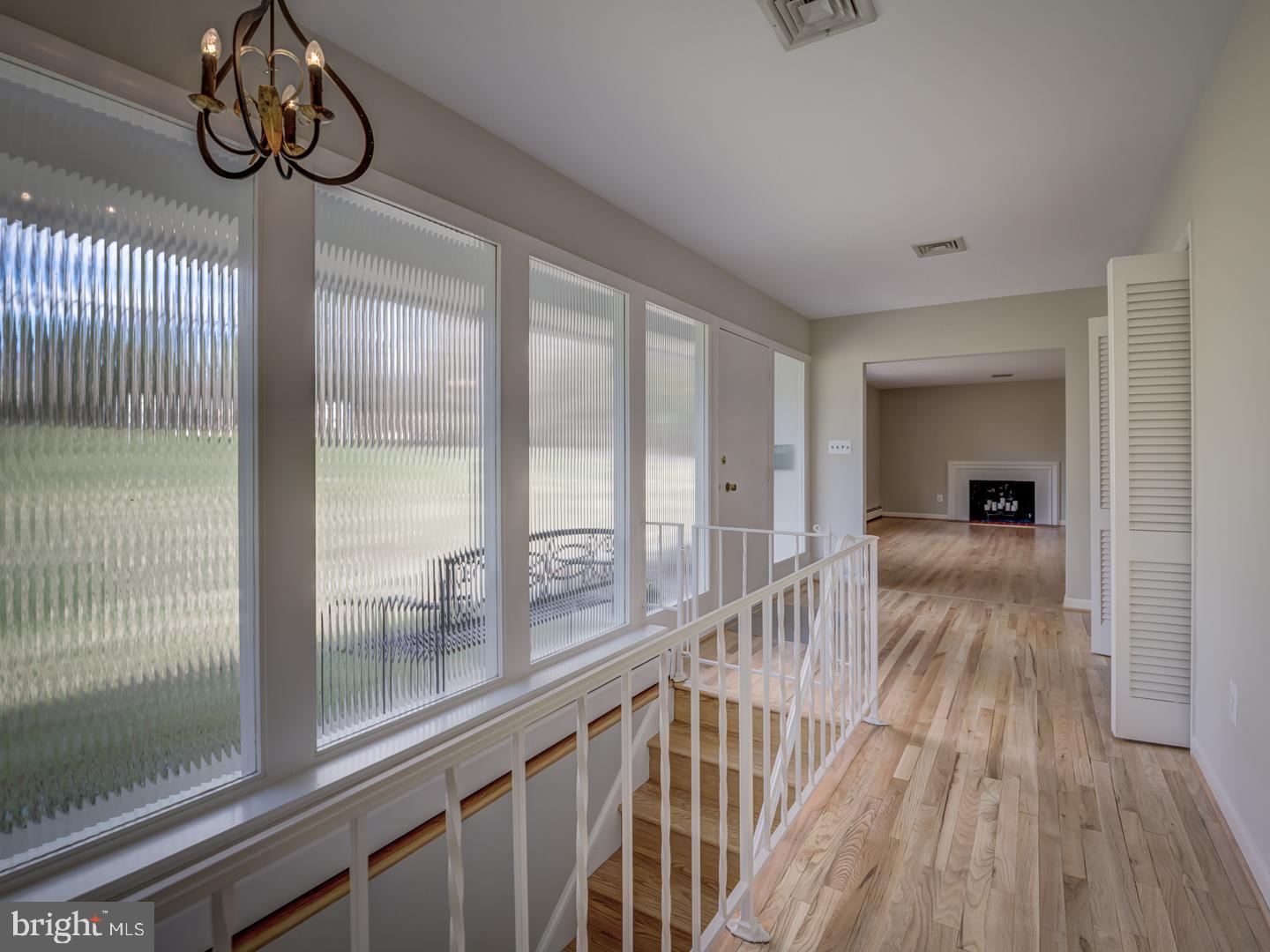 1928 Merrifields Drive Silver Spring, MD 20906 - Photo 3 of 46 Inviting entry foyer with reeded glass panels