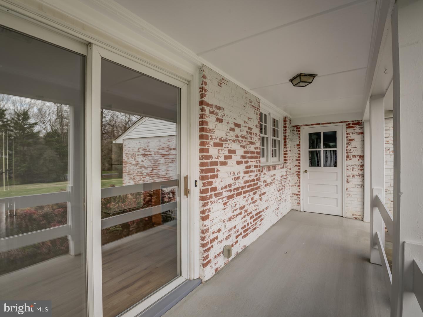 1928 Merrifields Drive Silver Spring, MD 20906 - Photo 42 of 46 Rear covered porch leads to garage